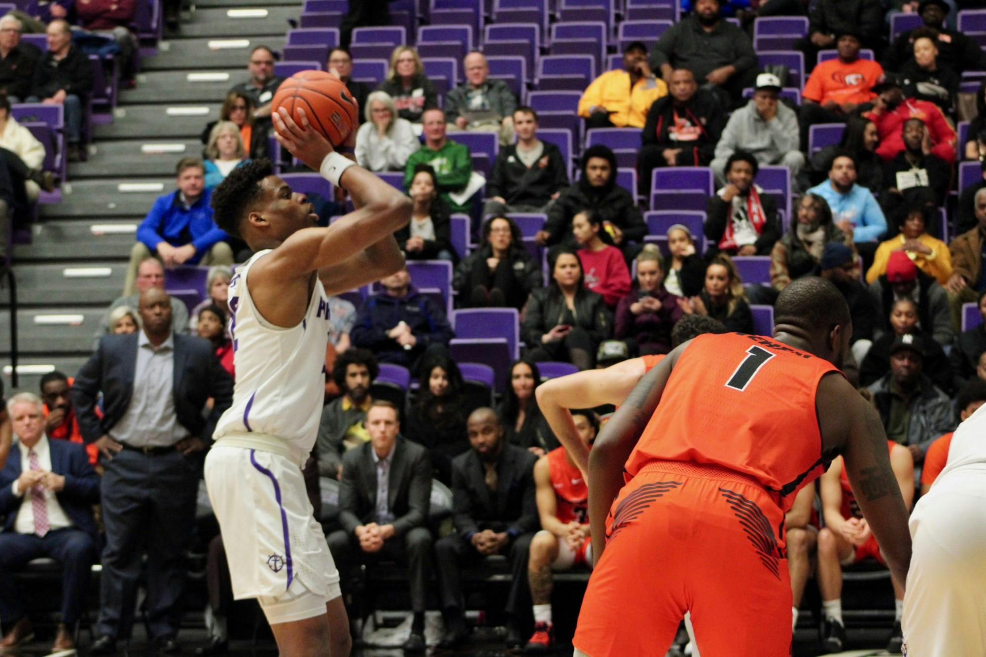 Sophomore Theo Akwuba attempts a free throw.