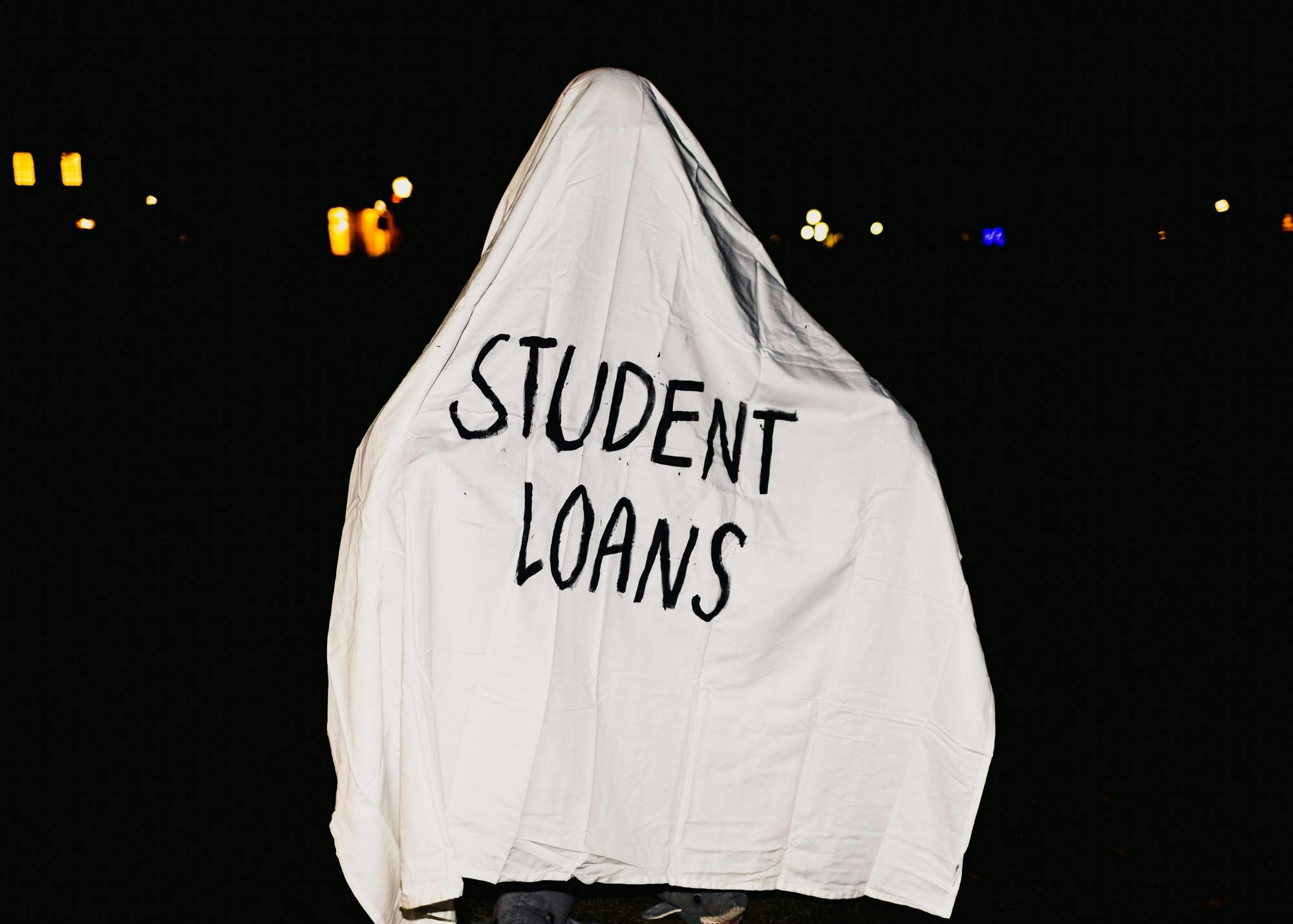 The most haunting costume of them all: Student Loans. Photo illustration by Molly Lowney. 