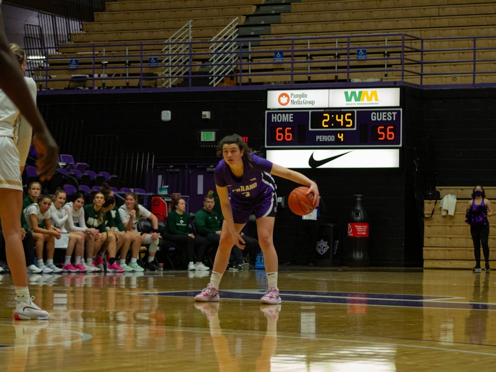 Guard Rose Pflug dribbles the ball in game against Colorado State