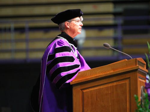  University President Fr. Mark Poorman gives his inaugural address Sept. 26 in the Chiles Center. Poorman, who took office July 1, said he hopes to expand the University’s campus and increase money for student scholarships. Photo by Alexandra Bush