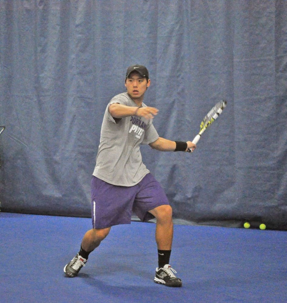  Senior tennis player Michel Hu Kwo. Photo by Kristen Garcia