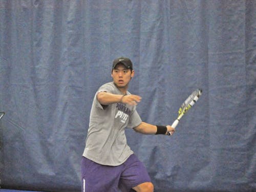  Senior tennis player Michel Hu Kwo. Photo by Kristen Garcia