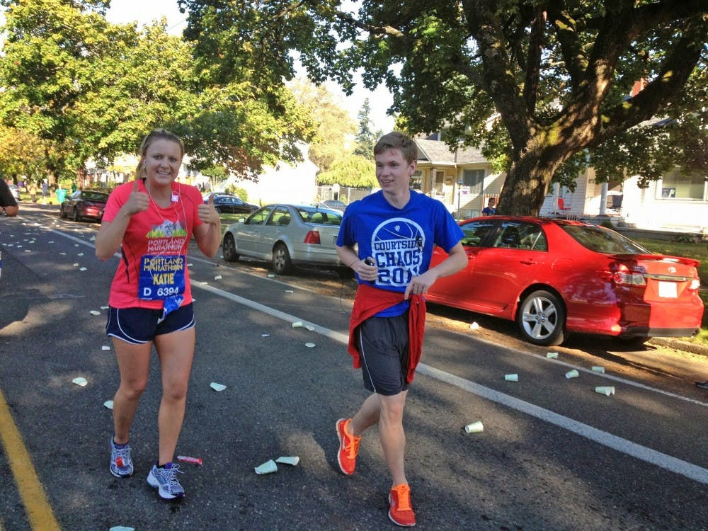  Junior Katie Kerr runs the marathon morning and is being paced by fellow Pilot junior Josh Cleary.Photo by Cassie Sheridan