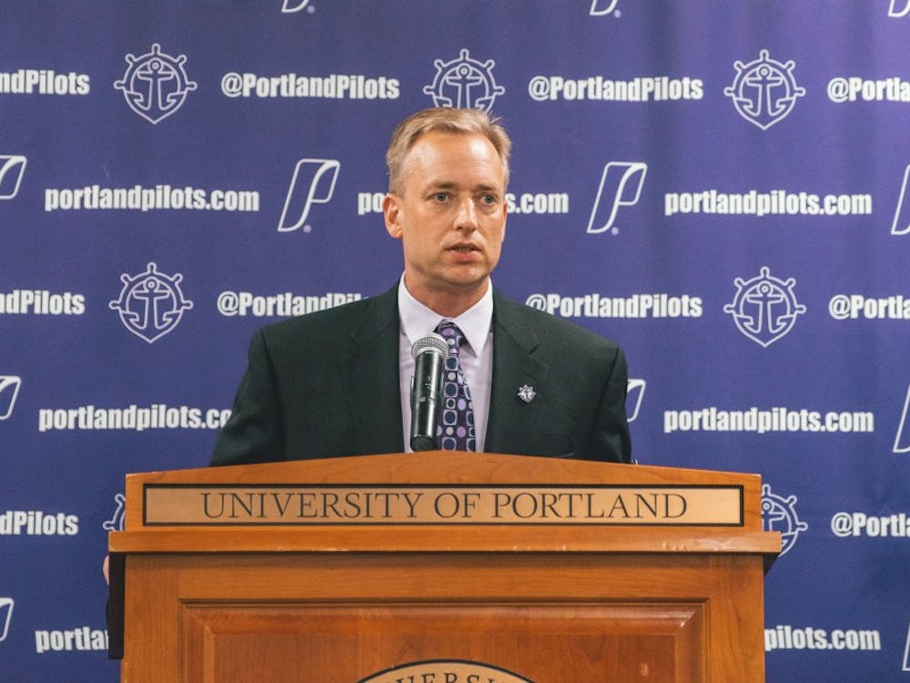 Michael Meek was formally introduced on Monday University of Portland's new women's basketball coach.