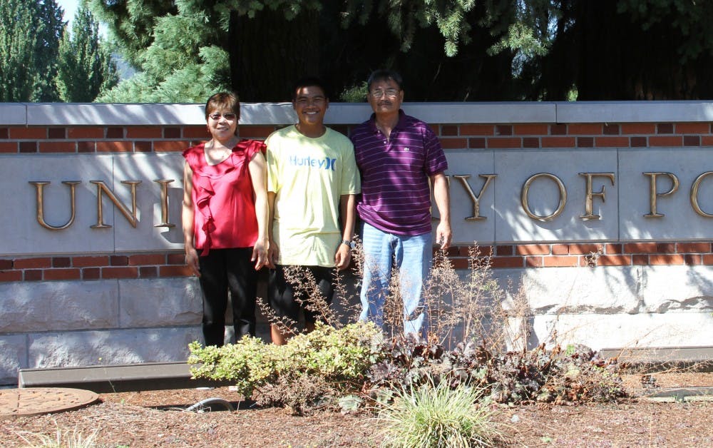 Sophomore Isaiah Ragasa and his parents visit UP. Though Ragasa does not consider either of his parents a best friend, he said he became closer to them when he left home to come to UP. Photo courtesy of Isaiah Ragasa