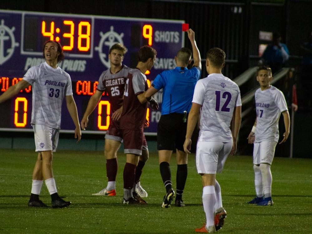 Portland takes a one man advantage after Colgate senior defenseman Christian Clarke receives a red card in the 95th minute.