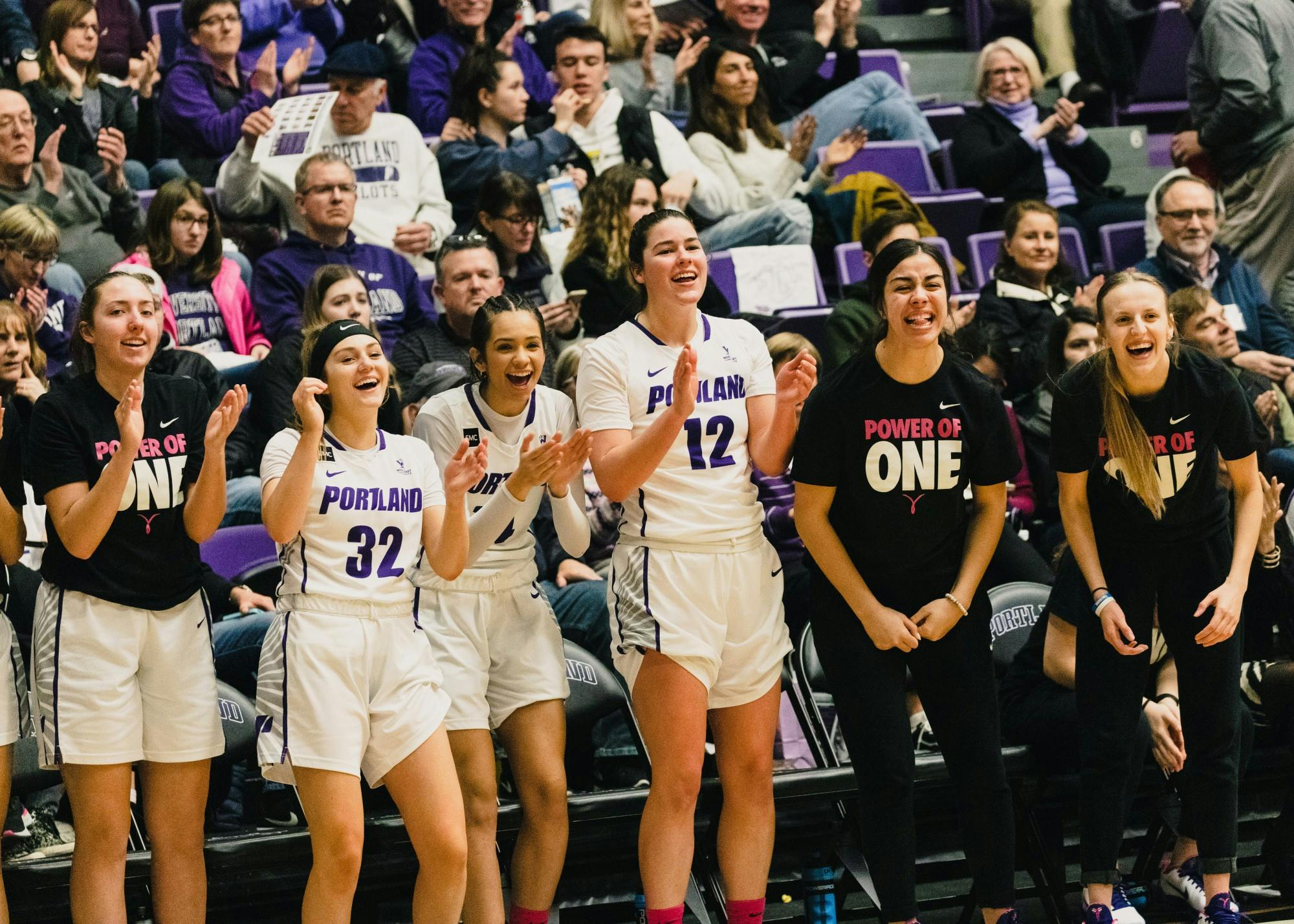 The Pilots cheer on their teammates from the bench.