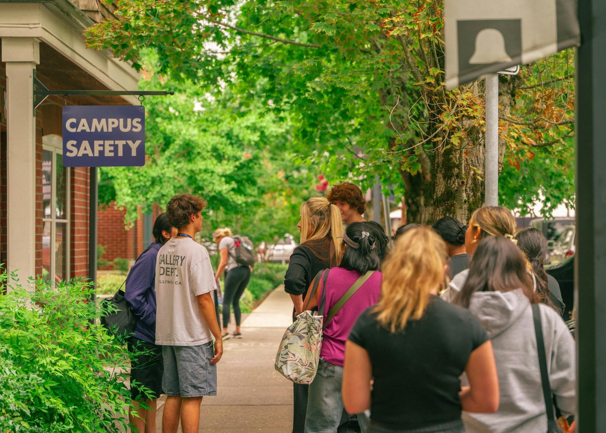 Students wait in line outside the Campus Safety office. 