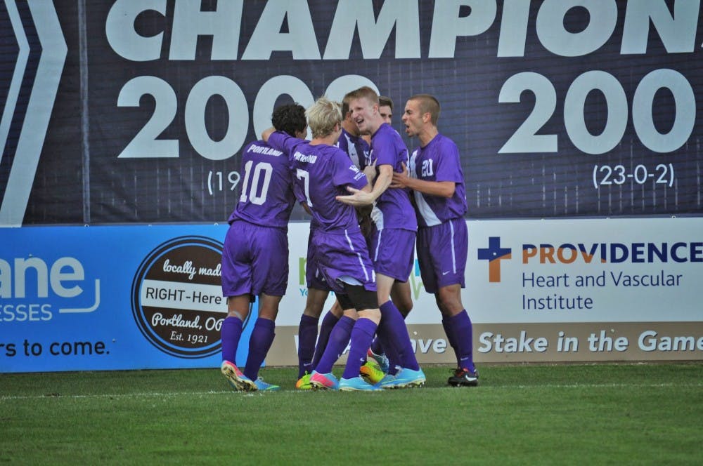  The men's soccer team celebrates a goal agains state rival Oregon State. The Pilots play at home Friday.Photo by Kristen Garcia