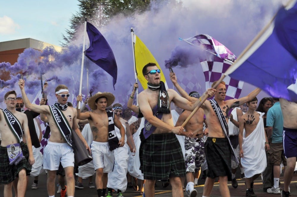  The Villa Drum Squad leads students into the opening game of the 2013 soccer season.Photo by Kristen Garcia