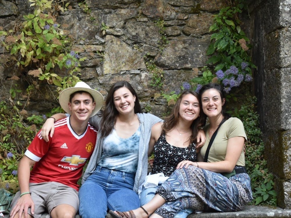 (Left to right) Cole Fitter, Rebecca Cole, Katie Wojda and Hannah Twomey smile while in Spain. Photo courtesy of Rebecca Cole.