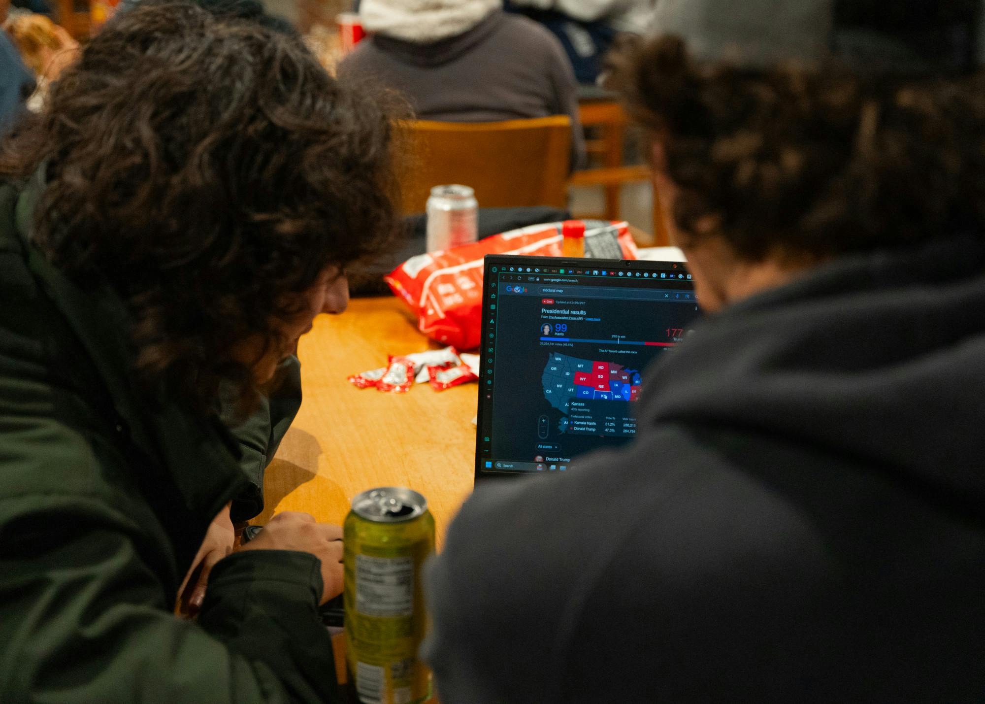 UP students watch the electoral map from The Associated Press on a laptop in the Pilot House. On Nov. 6 at 2:34 AM (PT), The Associated Press declared Donald Trump the winner of the 2024 election.
