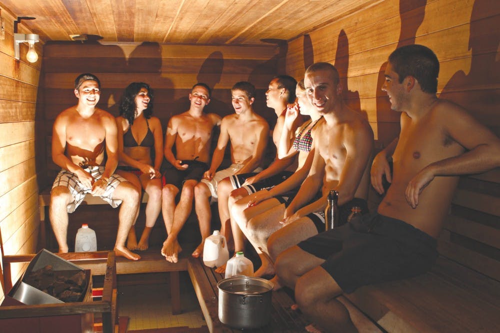 In sauna boys Men having