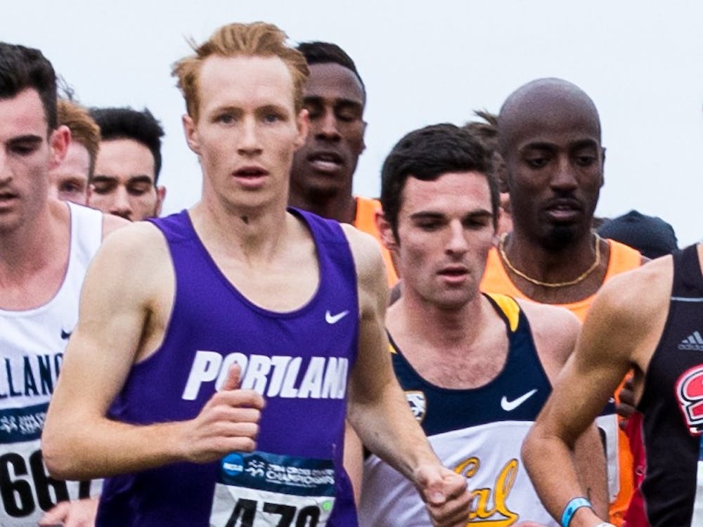 Former University of Portland cross country and track star Scott Fauble finished seventh overall and tops among Americans in the Boston Marathon on Monday.