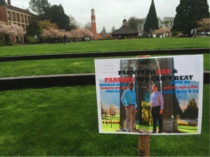  Rivera and Apenyo’s campaign poster in the academic quad. The two put up a total of 72 posters around campus last Friday. Photo by Cheyenne Schoen.