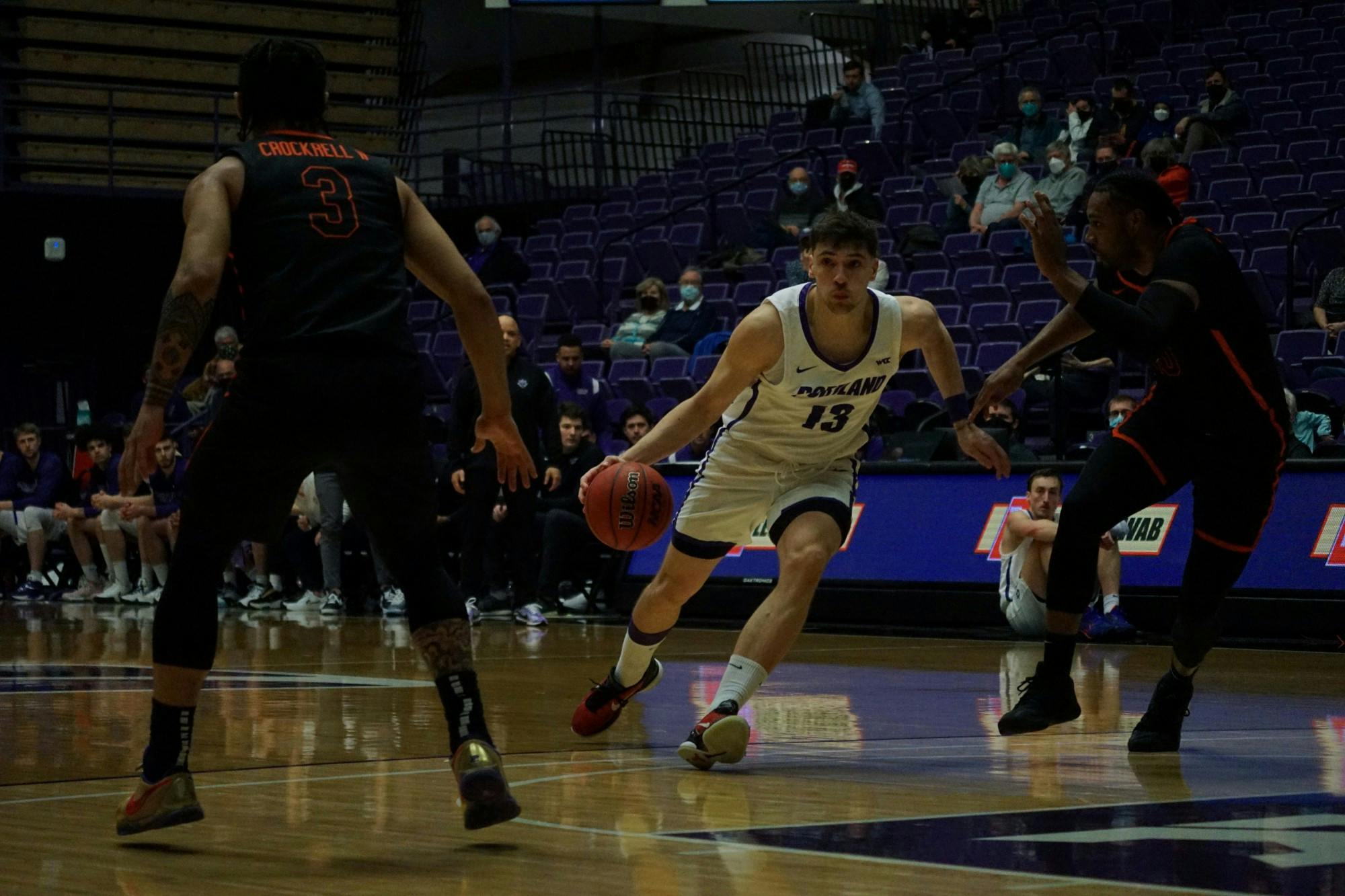 Freshman Matija Svetozarevic attacking the basket against Pacific.