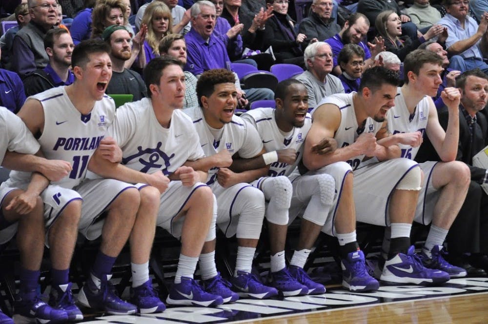  The Portland bench celebrates after the Pilots score. The Pilots defeated BYU 84-83 on Saturday afternoon.
