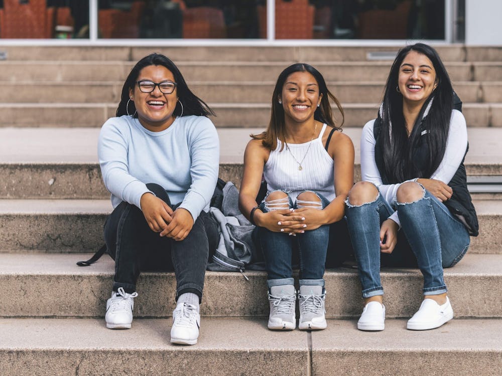 (Left to right) Ashley Moo-Julian, Evelyn Avila-Jimenez and Vanesa Frutos-Rodriguez, high school students from Roosevelt High School, attend classes here at UP.