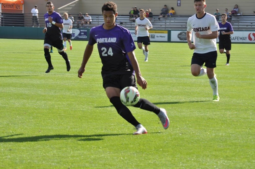  Photo by Kristen Garcia | Freshman Joey Jones dribbles the ball down Merlo Field. Jones scored the Pilots' only goal in the game against Gonzaga. This was his first career goal as a Pilot.