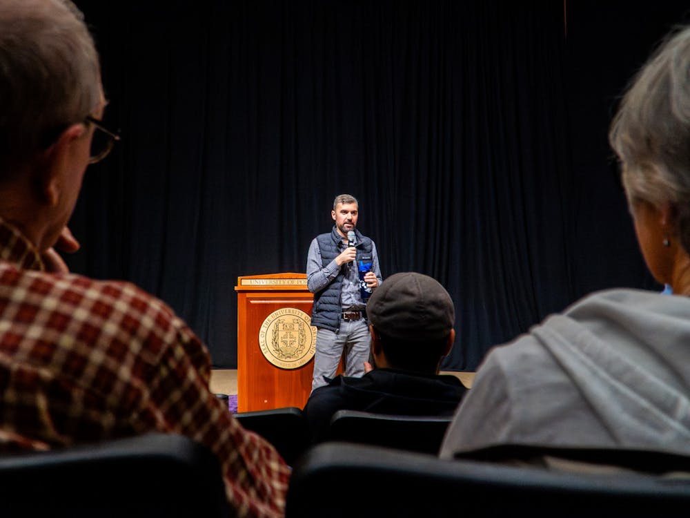 Pulitzer Prize-winning journalist Eli Saslow speaks about his book “Rising Out of Hatred” in Buckley Center Auditorium on Nov. 13, 2025.