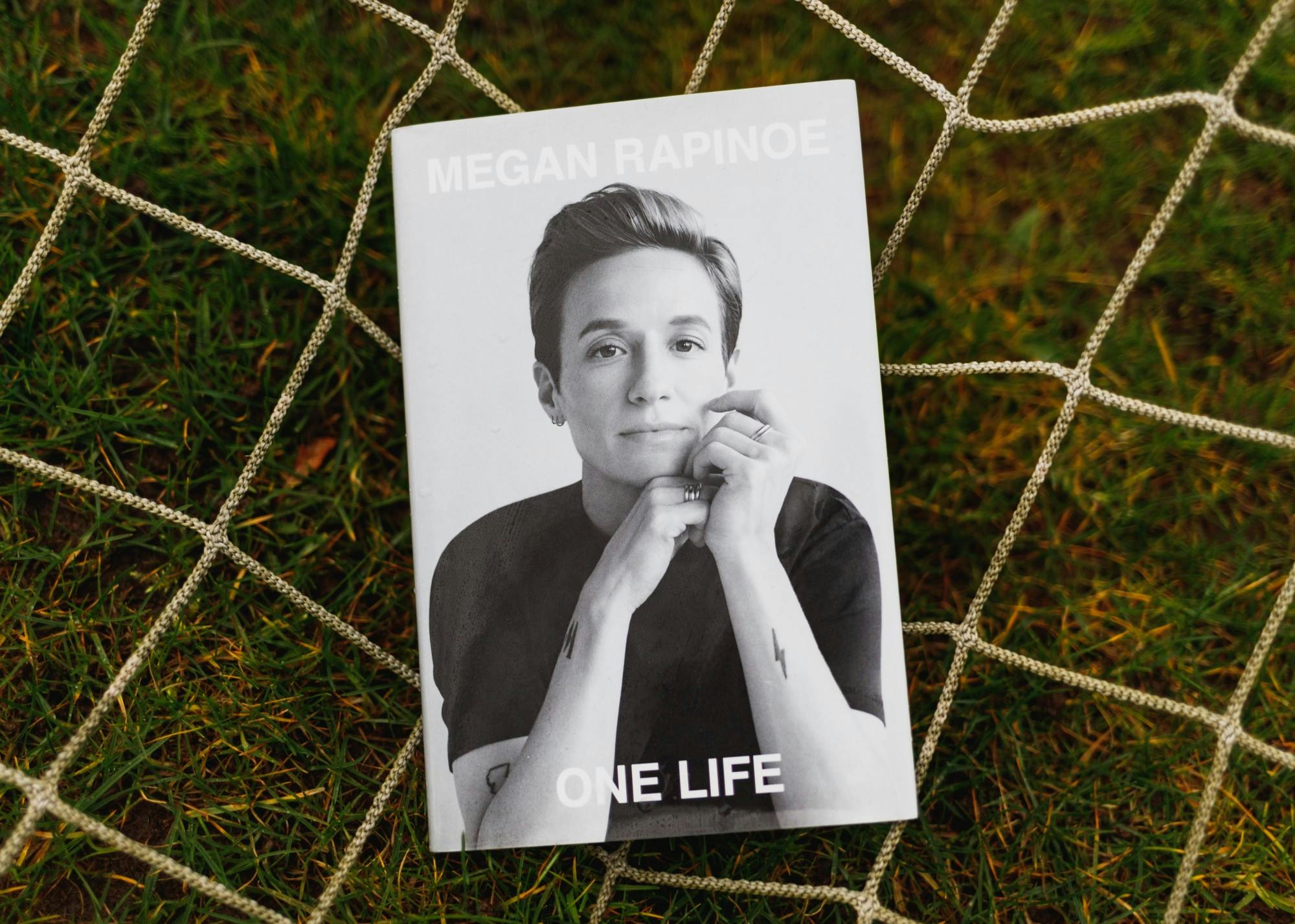 Megan Rapinoe's "One Life" was published in Nov. 2020. The book is a memoir of reflections on soccer, sexuality and social justice.Photo Illustration by Molly Lowney