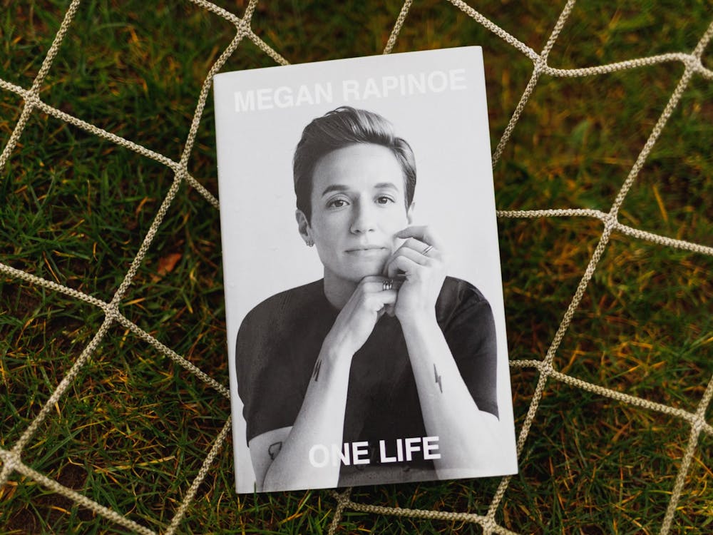 Megan Rapinoe&#x27;s &quot;One Life&quot; was published in Nov. 2020. The book is a memoir of reflections on soccer, sexuality and social justice.Photo Illustration by Molly Lowney