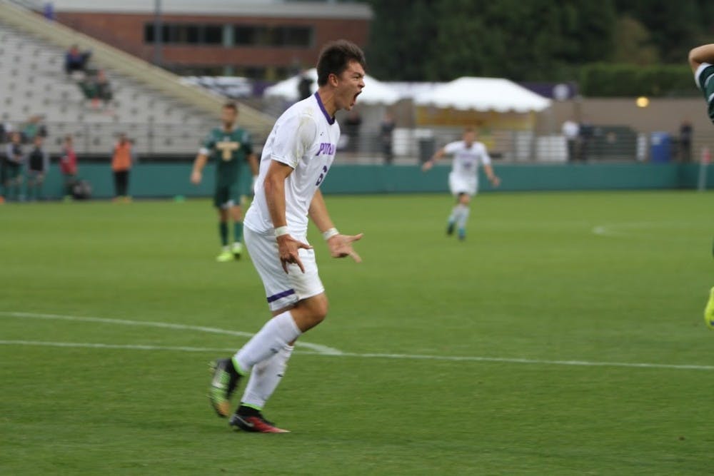  Photo Credit: Hannah Baade | Thomas Peterson celebrates after scoring a goal against Vermont on Sunday.