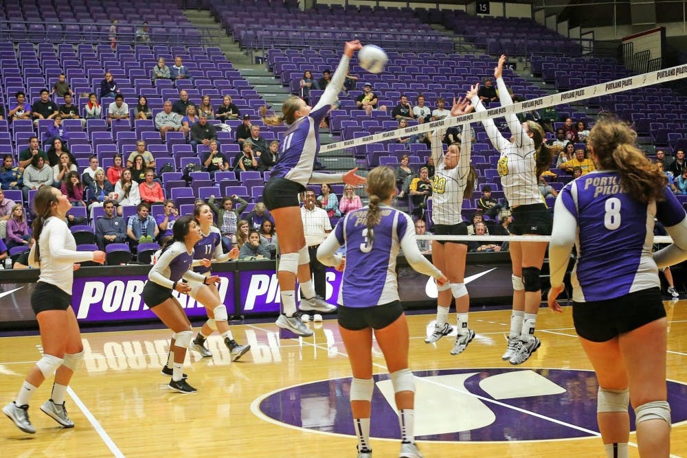  Senior outside hitter Autumn Wedan goes for akill as her teamates get ready for the ball to come back their side of the court. She leads the team in kills with 212.Photo by Becca Tabor