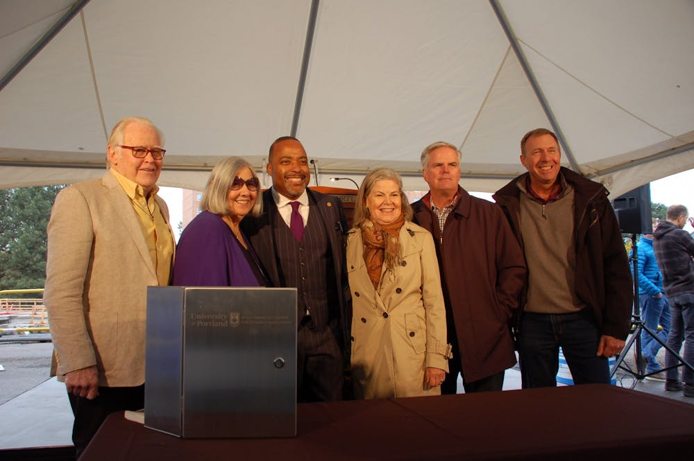 Darlene Shiley (left, second) stands beside President Robert Kelly at the groundbreaking ceremony for the Shiley-Marcos Center for Design and Innovation