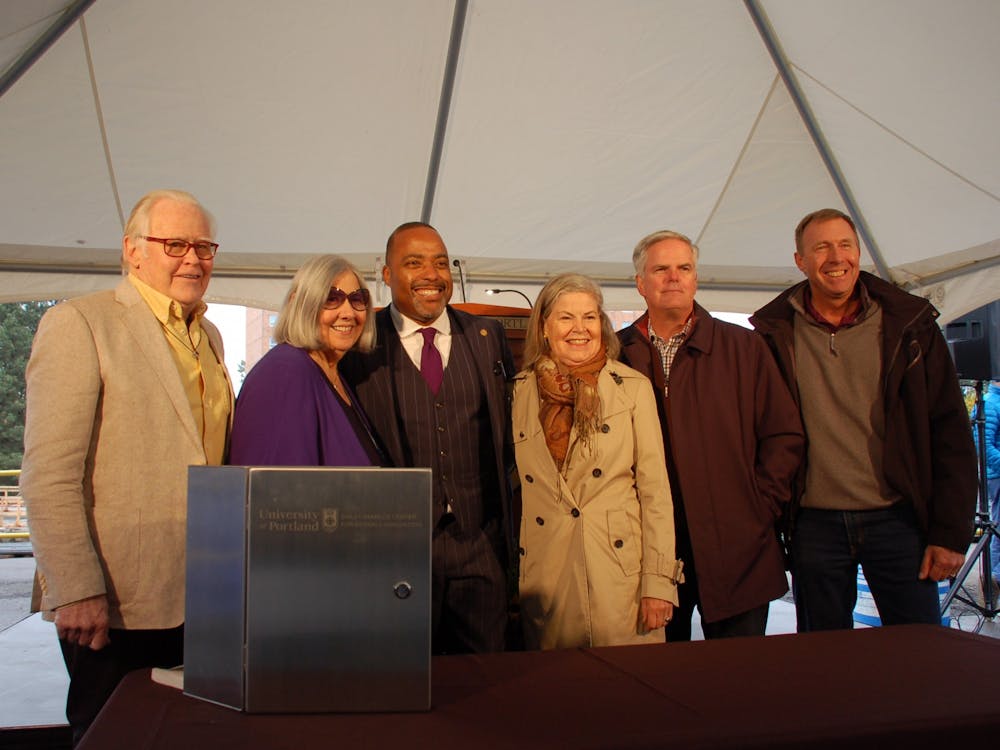 Darlene Shiley (left, second) stands beside President Robert Kelly at the groundbreaking ceremony for the Shiley-Marcos Center for Design and Innovation