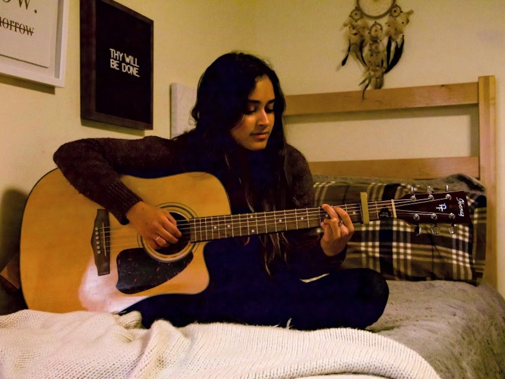 Sophomore Kaitlyn Fernandez plays the guitar and also writes her own music. &nbsp;She was originally inspired by Taylor Swift but has found a new sound since coming to Portland.