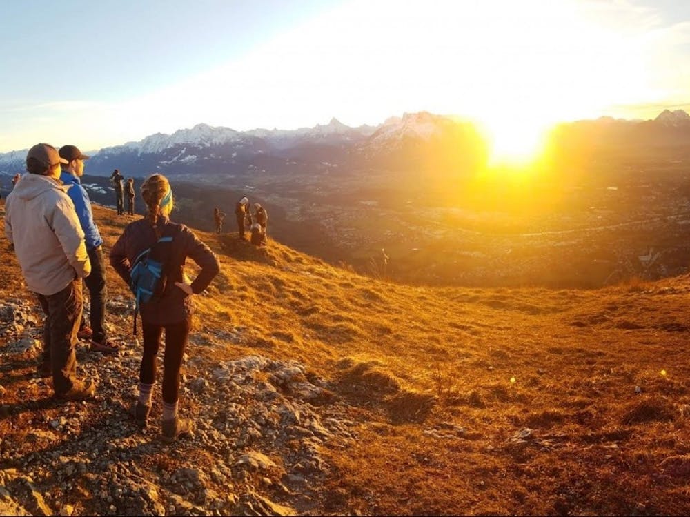 Students from the Salzburg program watch the sunset at the top of Gaisberg mountain in Austria.
Photo submitted by junior theater major Clare Kessi.&nbsp;