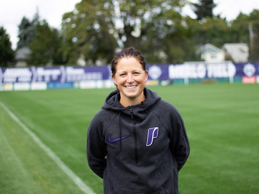 Michelle French smiles on her old (and new) stomping grounds, Merlo Field. She is excited to be back on The Bluff and carry on Clive Charles's legacy. Fun Fact: French has one older sister who is five years older and played soccer for Seattle U.