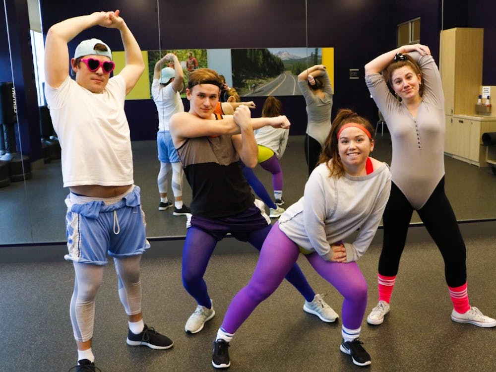 Dance of the Decades is back with a 90's workout theme and a new location — The Pure Space in downtown Portland. Showing off their workout wear and striking power poses (from left to right) are sophomores Quinn Anderson, Morgen Dempsey, CT Mayne and Emma Finney.
