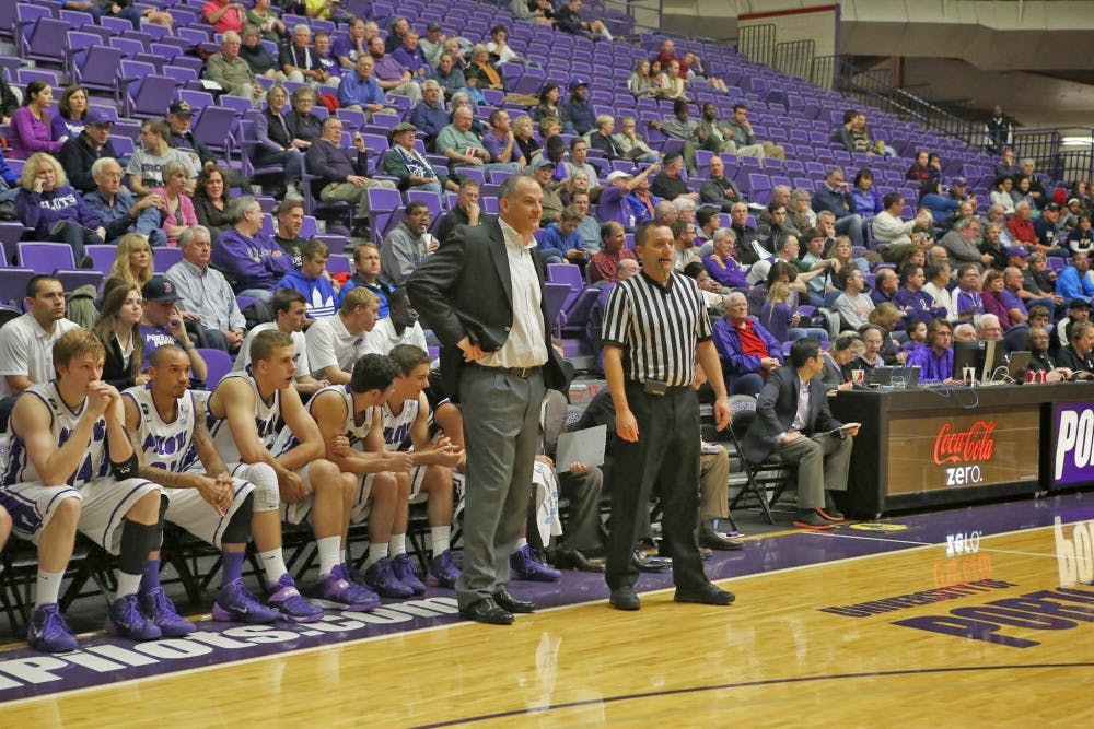  Men's basketball head coach Eric Reveno coaches the opening game of the year against UC Davis.Photo by Becca Tabor