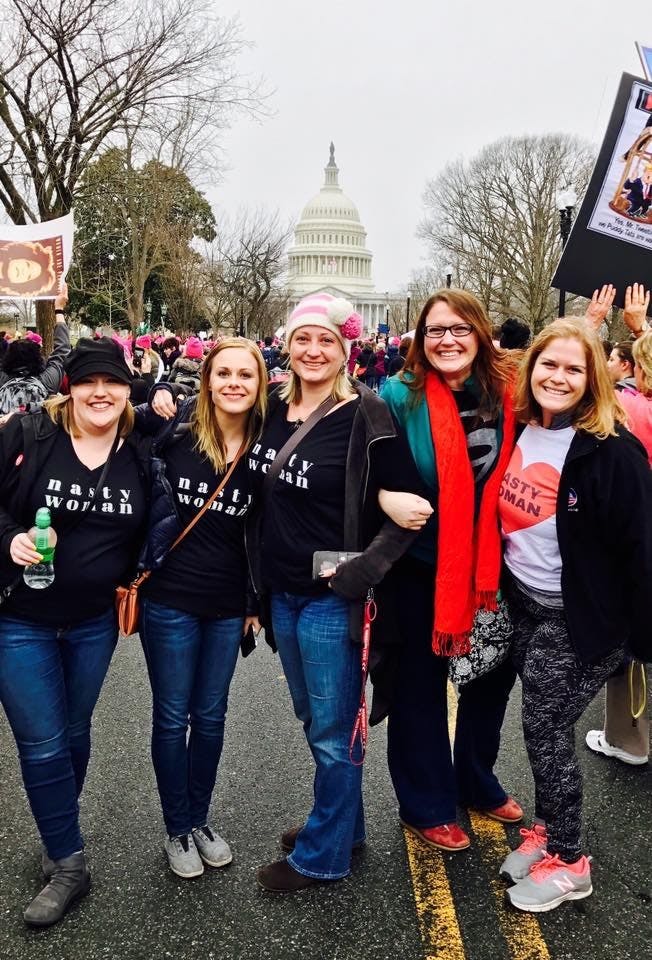 Brown and her co-marchers in front of the Capitol Building. Photo courtesy of Kelly Brown.