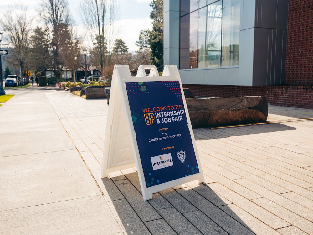 A sign advertising the UP internship and job fair. The Spring 2025 Internship & Job Fair will be held on Friday, Feb. 21, from 1 to 4 p.m. in Beauchamp.