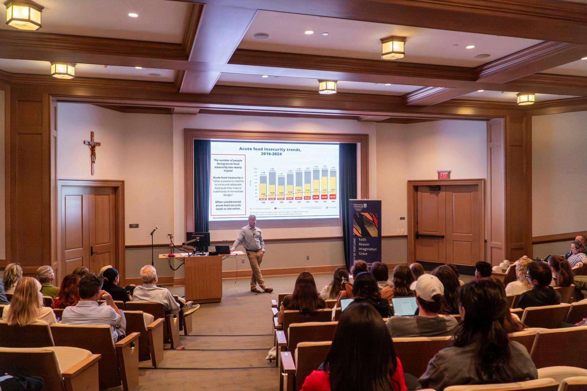David Austin, former Director of Strategic Partnerships with the United Nations World Food Programme, stands at the front of DB Auditorium on Oct. 2.