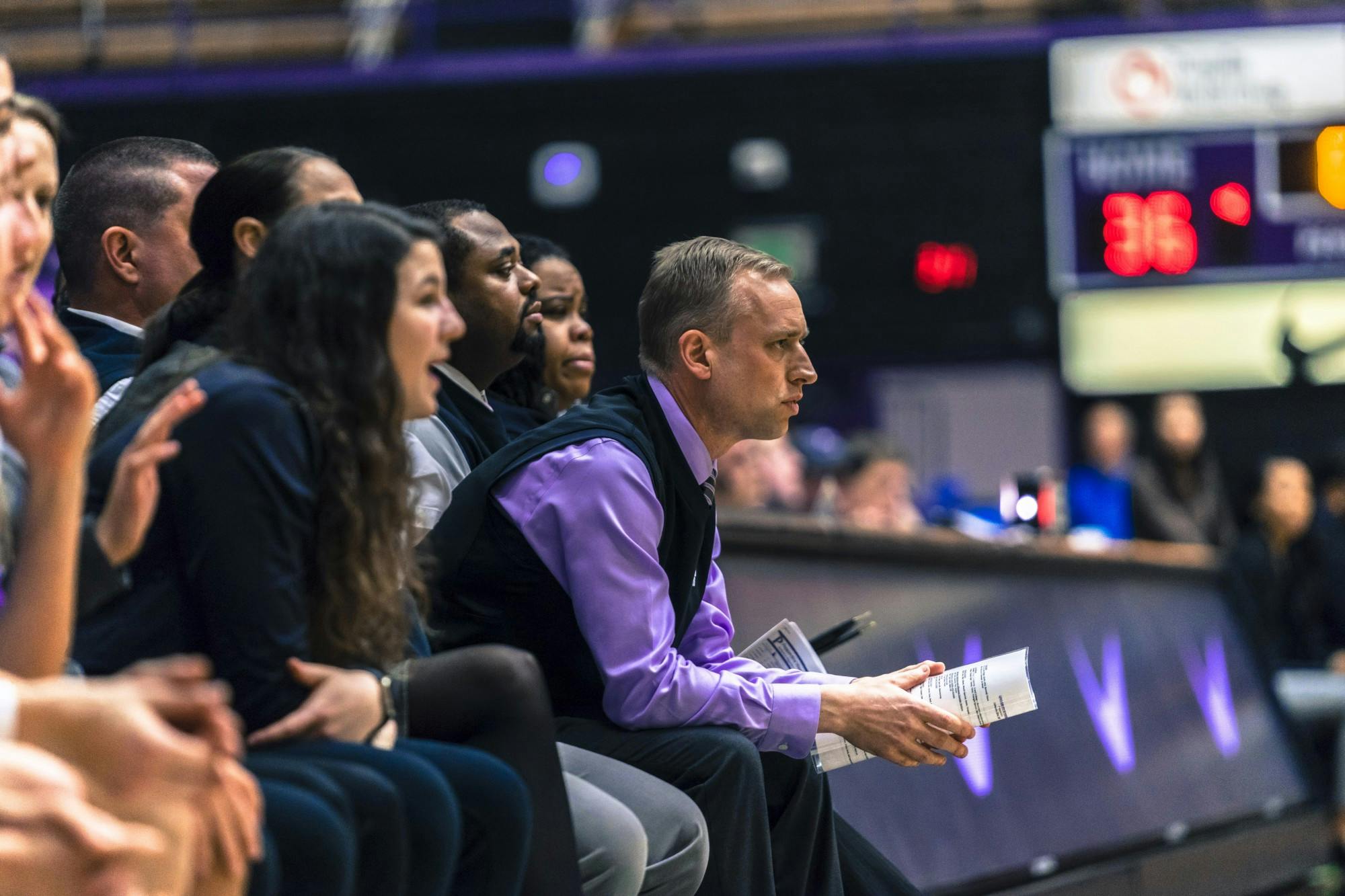 Head coach Michael Meek looks on tensely as his Pilots' lead narrows.