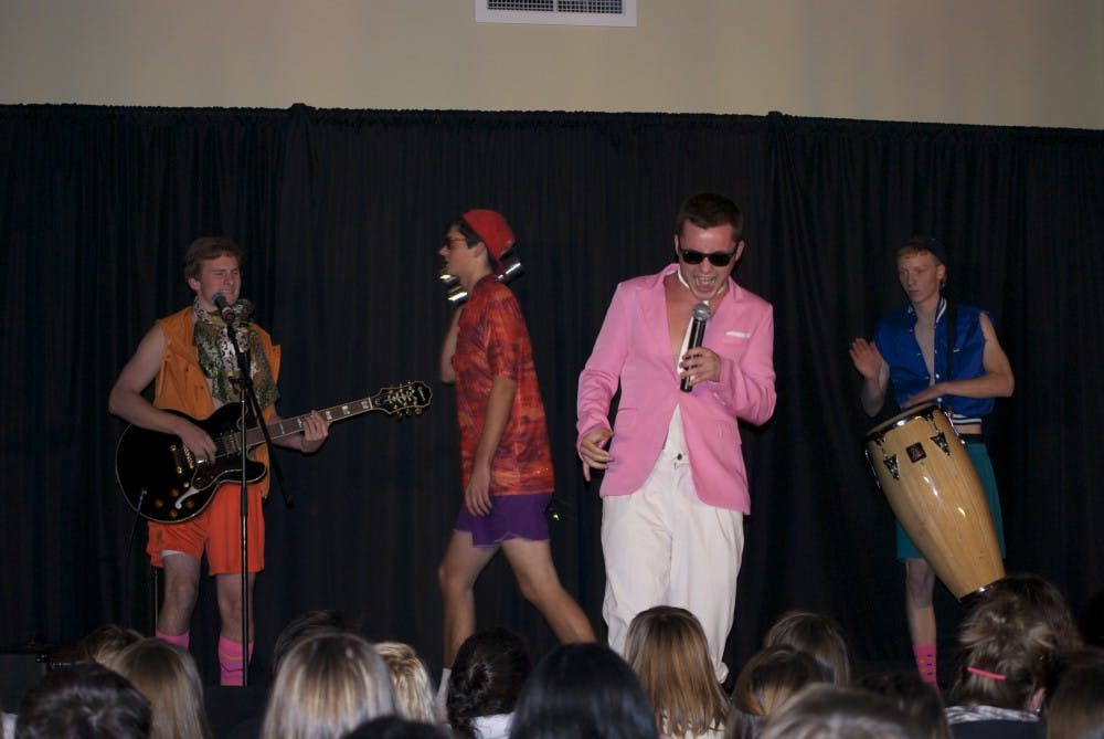 A group of students cover&nbsp;Macklemore's&nbsp;"And We Danced" at a Villa Man Auction in 2012.