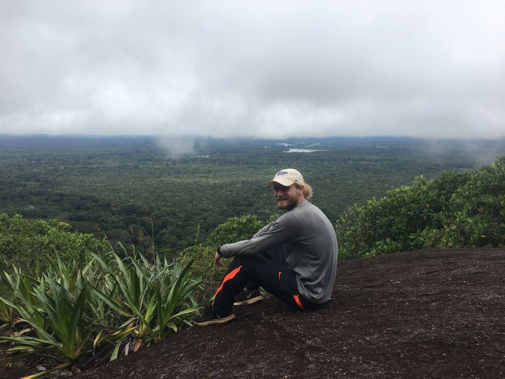 Senior David Gloyd smiles at the top of the Caño Sangre hike in Vaupés, Colombia.&nbsp;
Photo submitted by Gloyd.