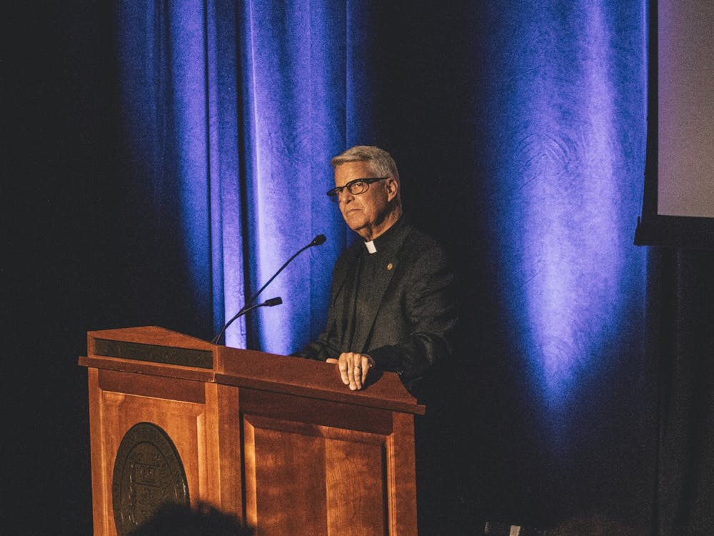 Fr. Mark Poorman announced Thursday that he will be vacating his position after the conclusion of the academic year. Photo from the Presidential Convocation, 2019. 