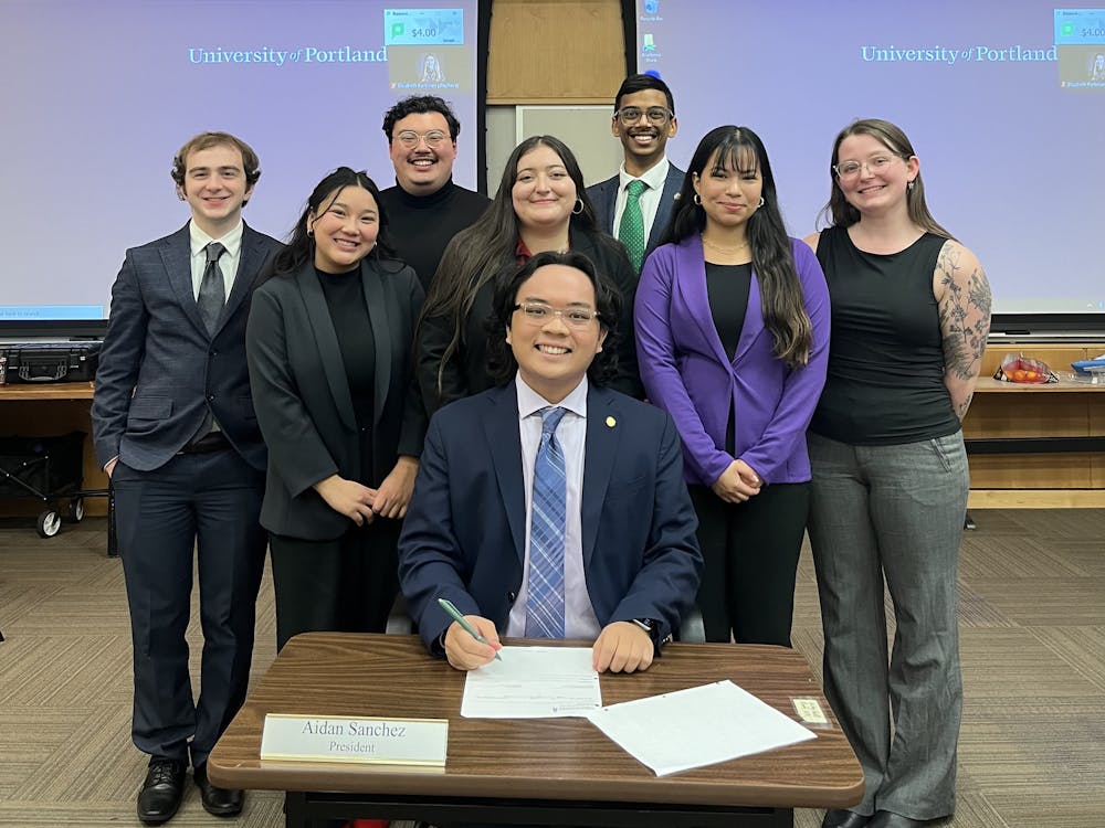 ASUP President Aidan James Sanchez sitting with other ASUP members. Photo courtesy of Aidan James Sanchez.