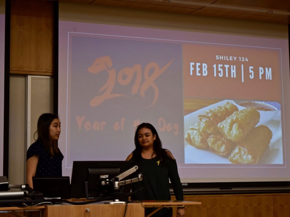 President Jenny Chu and Vice President Andrea Delin kick off International Club's Lunar New Years celebration with a quick presentation on this day's history.