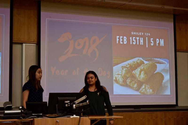 President Jenny Chu and Vice President Andrea Delin kick off International Club's Lunar New Years celebration with a quick presentation on this day's history.