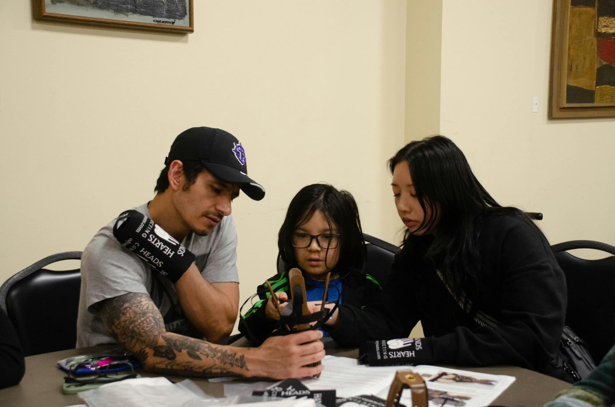 The “Helping Hands” event brought together students, staff, faculty and community members to build prosthetic hands for people around the world. 
