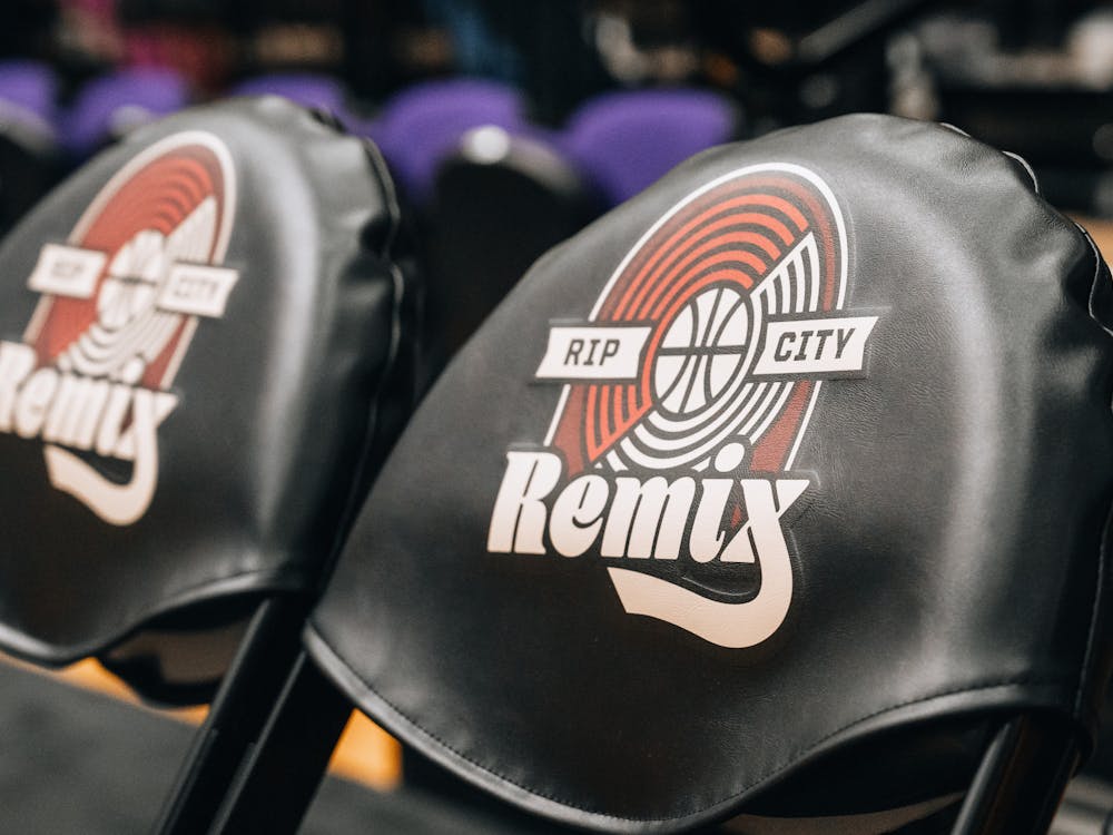 Rip City Remix branded chairs lining the basketball court in Chiles during the Fan Fest event.