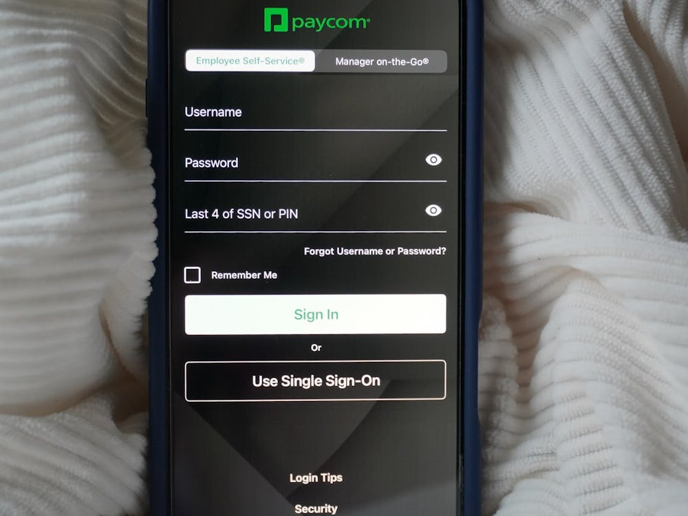 Sign-in page for the mobile Paycom app. A complete switch to Paycom, including all student employee timesheets, will occur this summer and next fall.