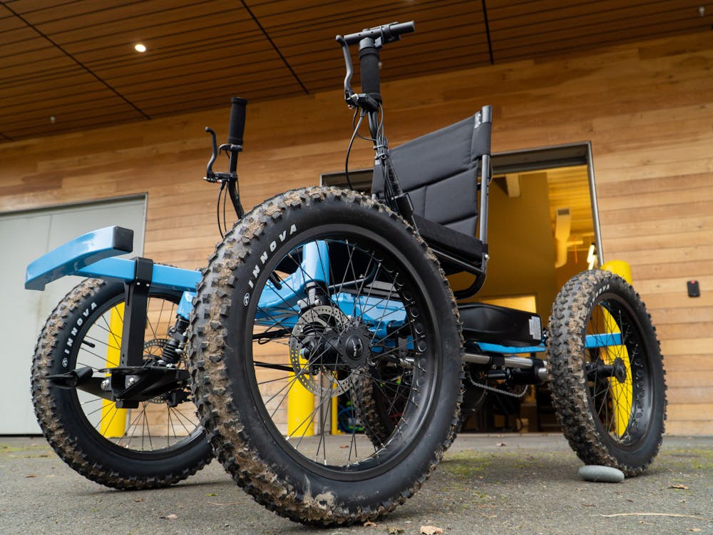 An off-road wheelchair offered by the University of Portland’s Outdoor Pursuits program sits outside the Outdoor Pursuits garage on campus. The chair is designed to help students navigate trails and rugged outdoor environments.