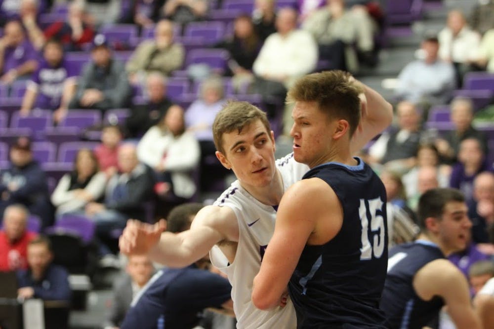  Photo by Hannah Baade | Phillip Hartwich guards a USD player on Thursday night.